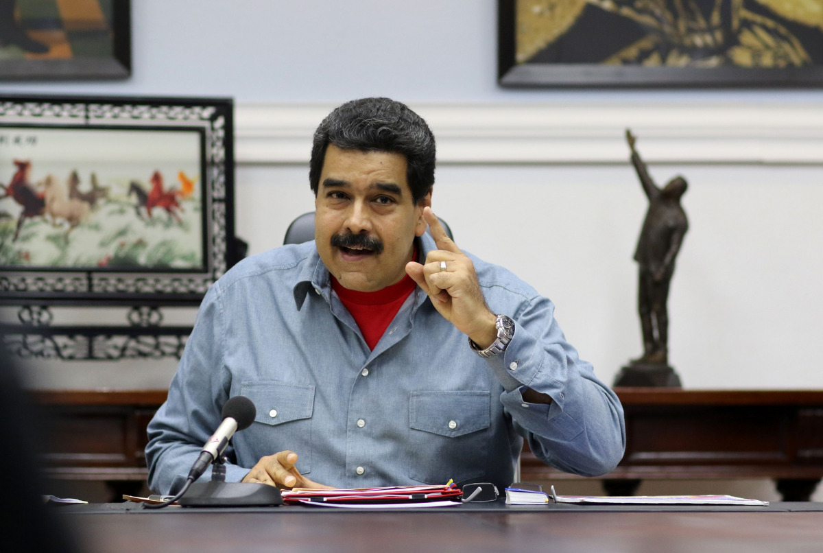 Venezuelan President Nicolas Maduro speaking during a meeting with ministers at the Miraflores presidential palace in Caracas on May 13, 2016. (AFP PHOTO / VENEZUELAN PRESIDENCY / MARCELO GARCIA) 