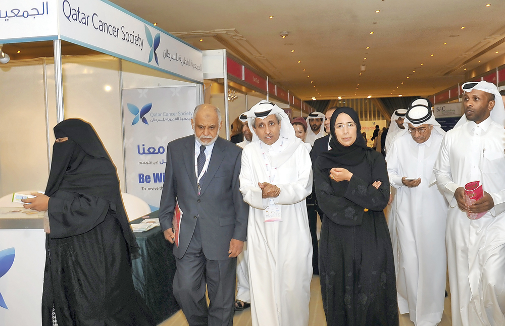 Minister of Public Health H E Dr Hanan Al Kuwari, (centre), Chairman of Qatar Cancer Society, Dr Sheikh Khalid bin Jabor Al Thani (second left), and senior officials during the opening of the Breast Cancer Conference at Sheraton Grand Doha Resort and Conv