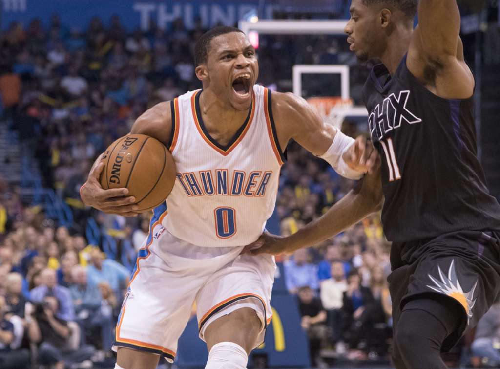 Russell Westbrook #0 of the Oklahoma City Thunder reacts as Brandon Knight #11 of the Phoenix Suns applies pressure during the second half of a NBA game at the Chesapeake Energy Arena on October 28, 2016 in Oklahoma City, Oklahoma. The Thunder won 113-110