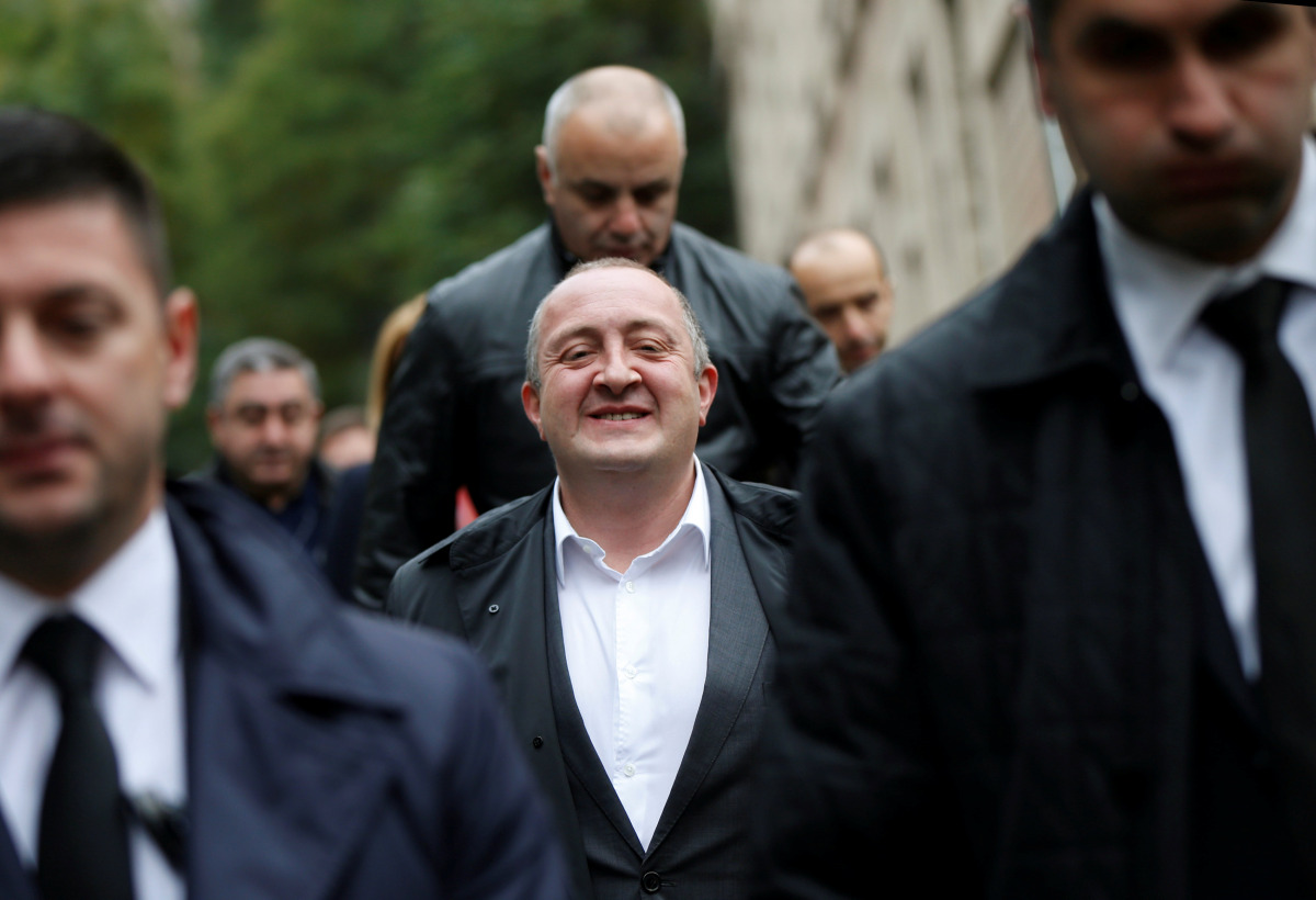 Georgia's President Georgy Margvelashvili leaves after voting during the second round of parliamentary election in Tbilisi, Georgia, October 30, 2016. REUTERS/David Mdzinarishvili