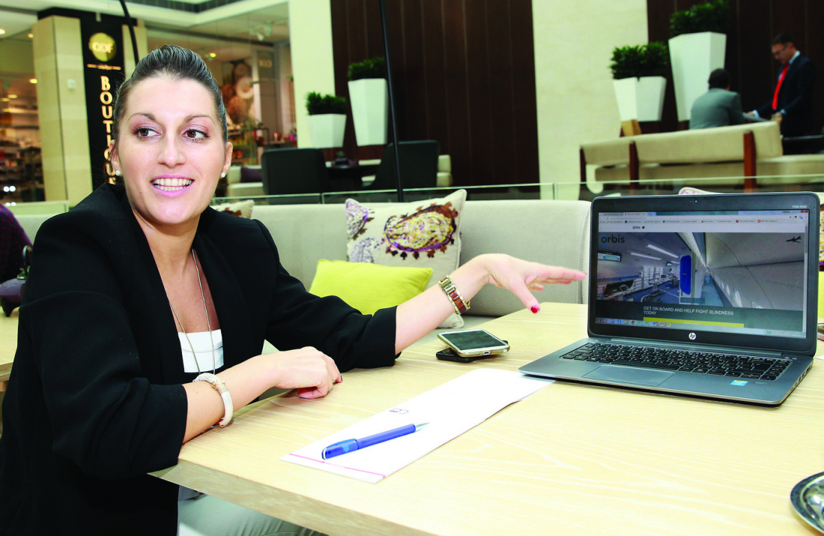 Florence Branchu, Head of Qatar Creating Vision (QCV) explaining Orbis Flying Eye Hospital Programme with virtual reality tool. Pic: Qassim Rahmatullah / The Peninsula