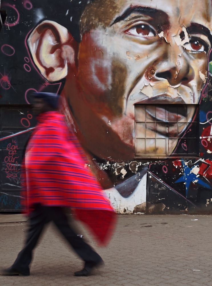 A man walks past a mural of US President Obama painted on a wall in Nairobi, Kenya, on November 8, 2016. Enthusiasm for the outgoing president has faded on a continent that he is accused of forsaking. The election of the first black president of the Unite