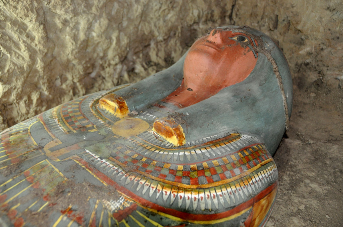 A handout picture released by Egypt's Antiquities Ministry on November 13, 2016 shows a sarcophagus containing a millennia-old mummy which was found by Spanish archaeologists near the southern Egyptian town of Luxor. The body was found in a tomb likely da