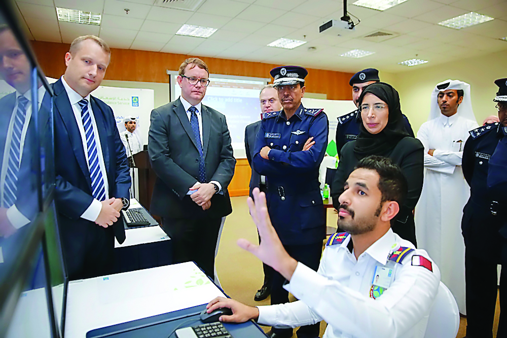 Minister of Public Health H E Dr Hanan Mohamed Al Kuwari, and other officials being briefed about the new technology introduced by the Ambulance Service yesterday.