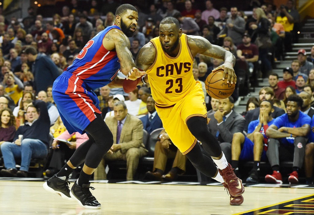 Cleveland Cavaliers forward LeBron James (23) drives on Detroit Pistons forward Marcus Morris (13) during the second half at Quicken Loans Arena. The Cavs won 104-81.