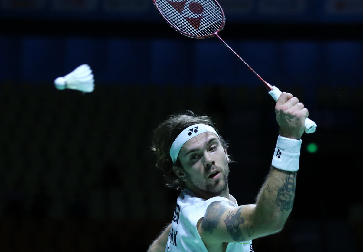 Denmark's Jan O Jorgensen plays a shot against China's Chen Long in the final of the China Open Badminton tournament in Fuzhou, in China's Fujian province on November 20, 2016. (AFP)