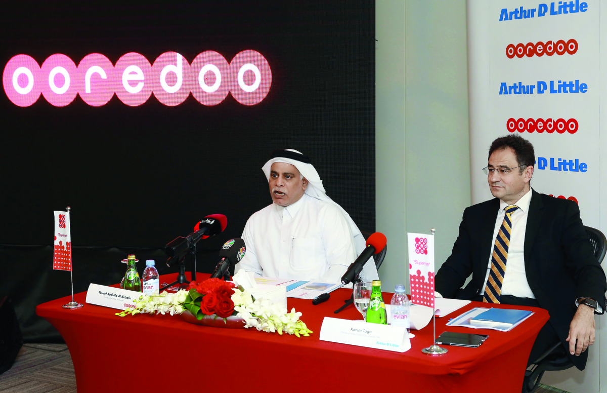 Yousuf Abdulla Al Kubaisi (left), Chief Operating Officer, Ooredoo Qatar; and Dr Karim Taga, Managing Partner and Global Practice Leader, ADL TIME practice, at a press conference held yesterday at Ooredoo headquarters. Pic: Qassim Rahmatullah / The Penin