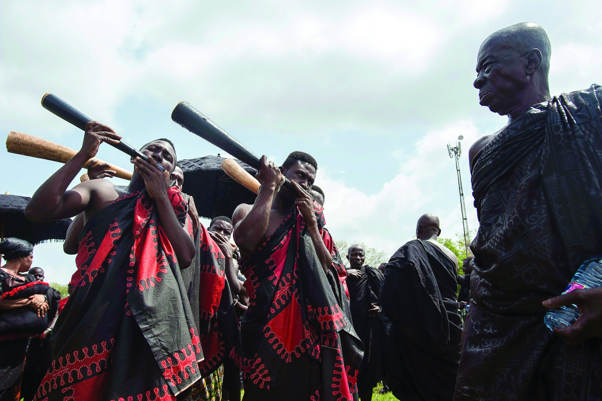 People attend the official ceremony following the death of Nana Afia Kobi Serwaa Ampem II, the 13th queen mother of the Asante Kingdom (Asantehemaa), in Kumasi.