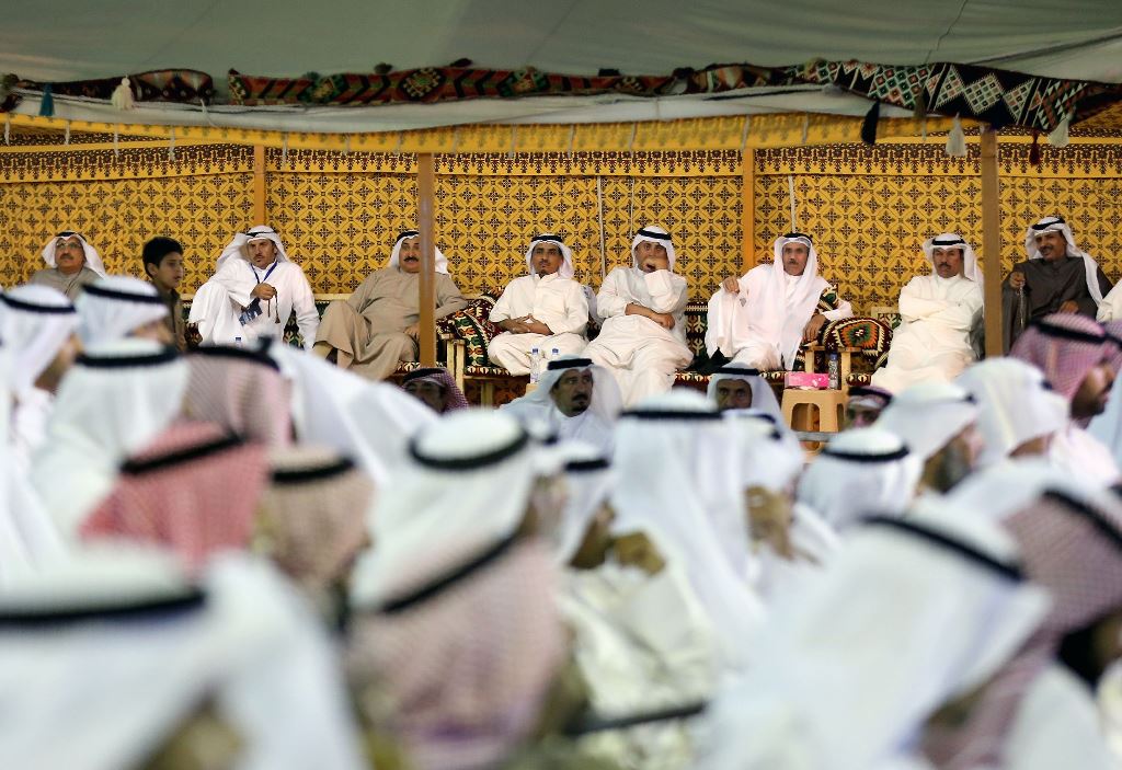 Kuwaitis attend an election campaign meeting for the upcoming parliamentary election, in Kuwait City, late on November 23, 2016. AFP / Yasser Al-Zayyat