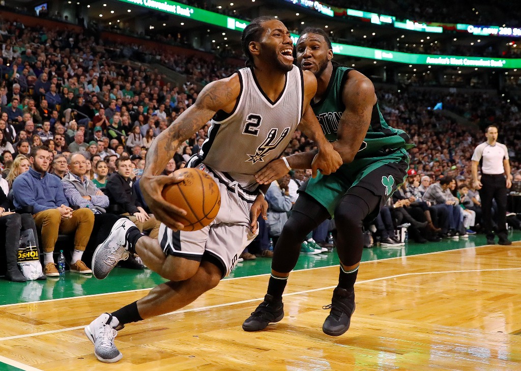 San Antonio Spurs forward Kawhi Leonard (2) drives past Boston Celtics forward Jae Crowder (99) during the second half of the San Antonio Spurs 109-103 win over the Boston Celtics at TD Garden. Credit: Winslow Townson
