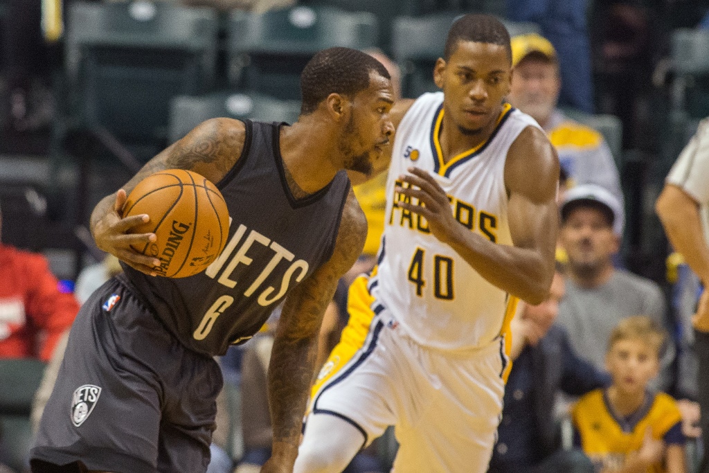 Brooklyn Nets guard Sean Kilpatrick (6) dribbles the ball while Indiana Pacers guard Glenn Robinson III (40) defends in the first quarter of the game at Bankers Life Fieldhouse. Trevor Ruszkowski-USA TODAY Sports