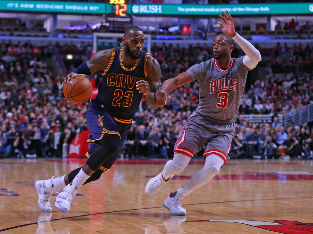 Cleveland Cavaliers forward LeBron James (23) drives past Chicago Bulls guard Dwyane Wade (3) during the second half at the United Center. Chicago won 111-105. Dennis Wierzbicki
