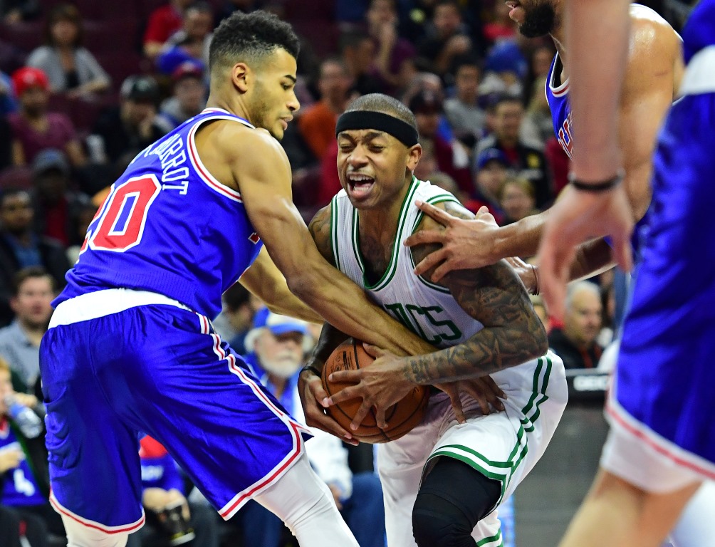 Boston Celtics guard Isaiah Thomas (4) and Philadelphia 76ers guard Timothe Luwawu-Cabarrot (20) battle for the ball during the second quarter at Wells Fargo Center. Eric Hartline\USA TODAY Sports