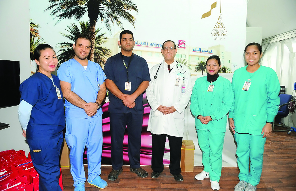 Al Ahli Hospital staff at the first-aid clinic at Darb El Saai.