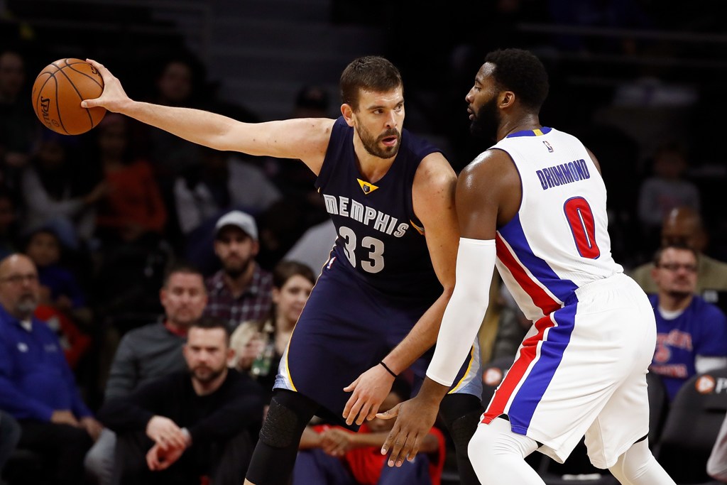 Marc Gasol #33 of the Memphis Grizzlies looks to make a move against Andre Drummond #0 of the Detroit Pistons during the second half at the Palace of Auburn Hills on December 21, 2016 in Auburn Hills, Michigan. Memphis won the game 98.86. Gregory Shamus/A