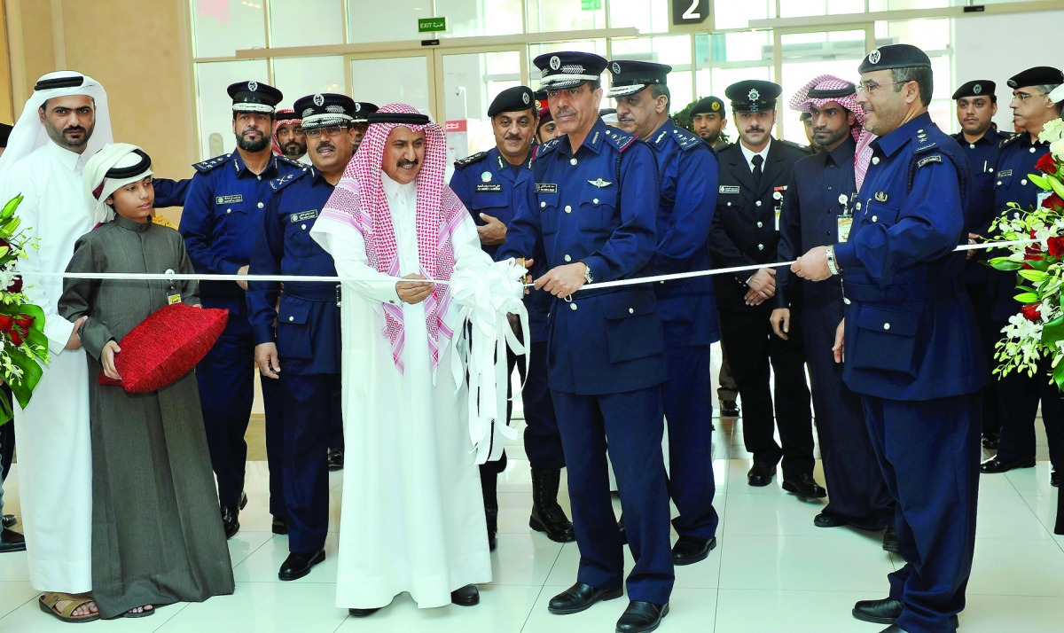 Major General Saad bin Jassim Al Khulaifi (centre), Director General of Public Security Department at the Ministry of Interior, with other officials cutting a ribbon to inaugurate the Gulf Prisoners Week at the Gulf Mall yesterday. Pic: Kammutty V P / The