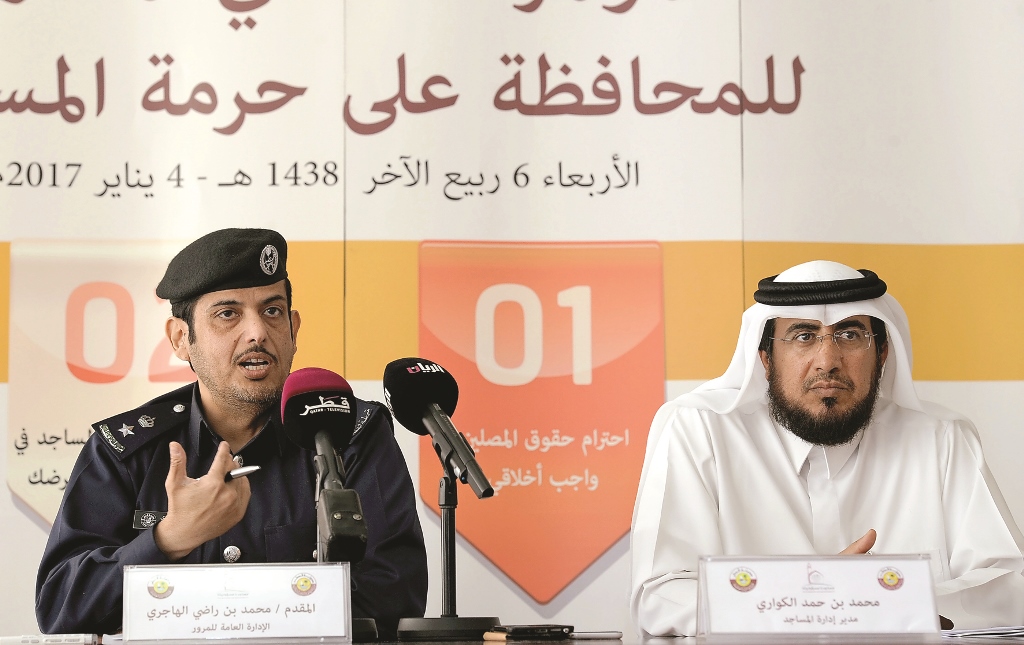 Lieutenant Colonel Mohammed Radi Al Hajri, Director of Media and Awareness at the Traffic Department, and Mohamd bin Hamad Al Kuwari, Head of the Mosques Management Department at the Ministry of Awqaf and Islamic Affairs, at the press conference held at t