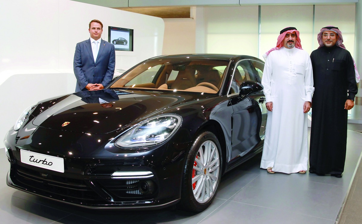 Salman Jassem Al Darwish (second right), Chairman & CEO of Porsche Centre Doha, Al Boraq Automobiles, and other officials at the new Porsche Panamera launch event held at the Porsche Centre Doha. Pic: Qassim Rahmatullah / The Peninsula