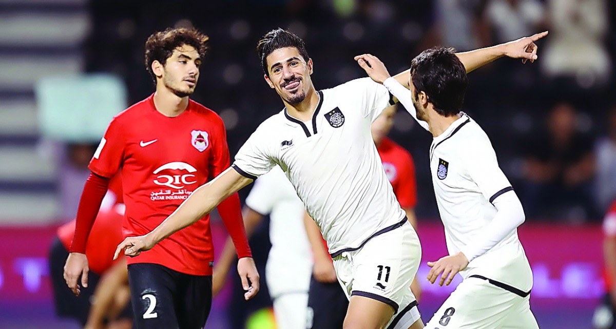 Al Sadd's Bagdad Bounedjah (centre) celebrates after scoring one of his three goals during yesterday's El Clasico against Al Rayyan at Jassim Bin Hamad Stadium in this December 2016 file photo. 