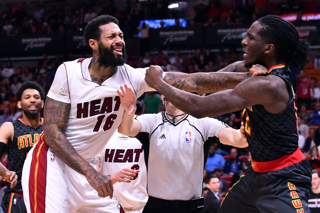 Miami Heat forward James Johnson (16) shoves Atlanta Hawks forward Taurean Prince (12) after an flagrant foul by Hawks forward Taurean Prince during the second half at American Airlines Arena. Miami Heat won 116-93.Steve Mitchell
