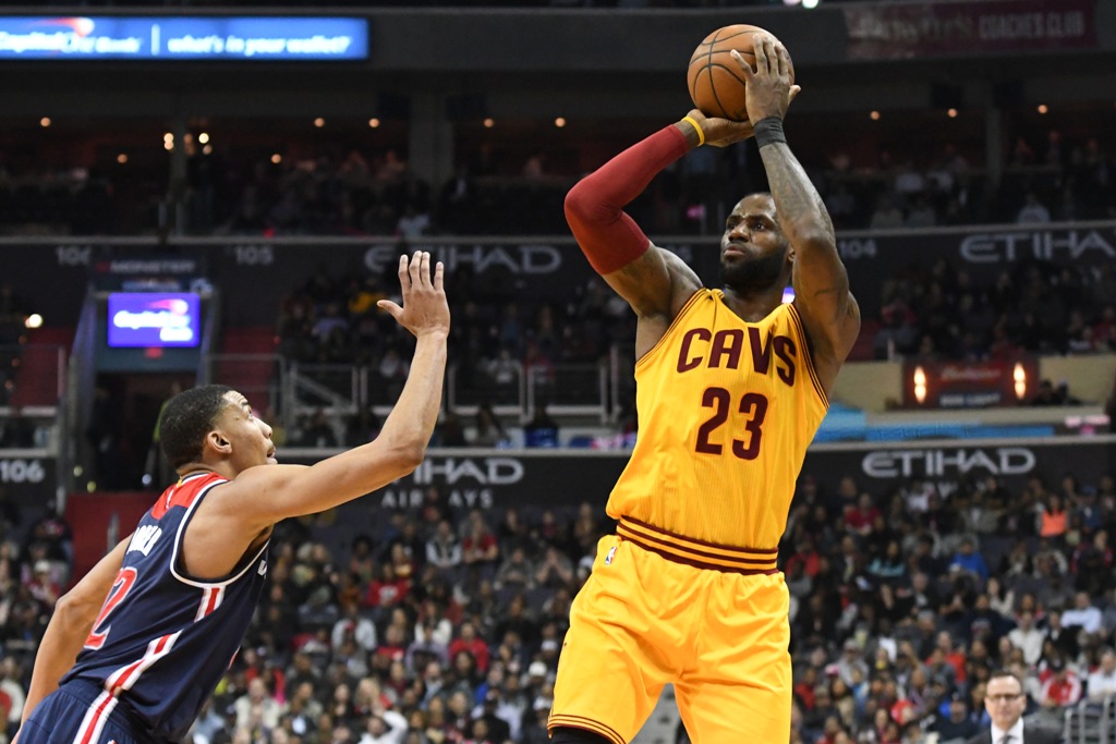 Cleveland Cavaliers forward LeBron James (23) shoots over Washington Wizards forward Otto Porter Jr. (22) during the first quarter at Verizon Center. Tommy Gilligan
