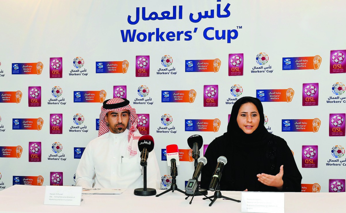 Hassan Al Kuwari, Acting Executive Director of Marketing and Communication at QSL, and Fatma Al Nuaimi, Director of Communications at Supreme Committee for Delivery and Legacy, at the press conference. Pic: Kammutty V P / The Peninsula