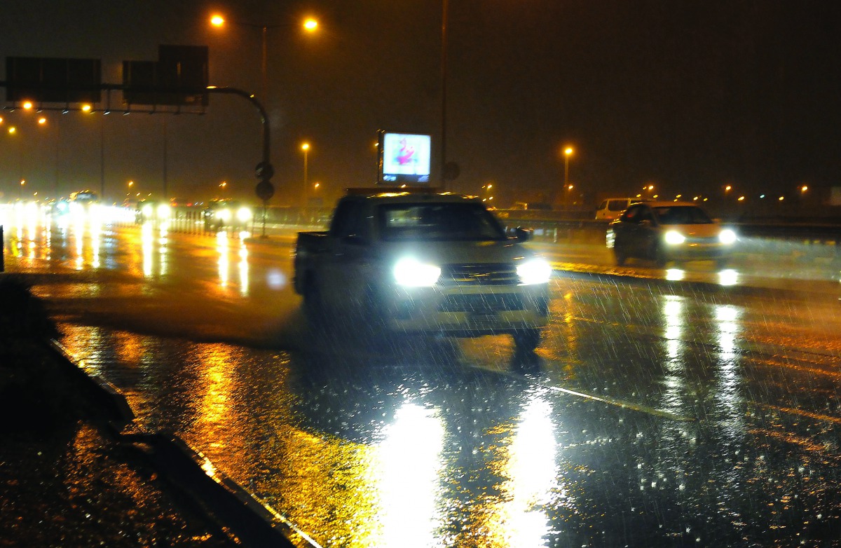 Vehicles passing through F-Ring Road during heavy rains. Pic: Kammutty V P/The Peninsula