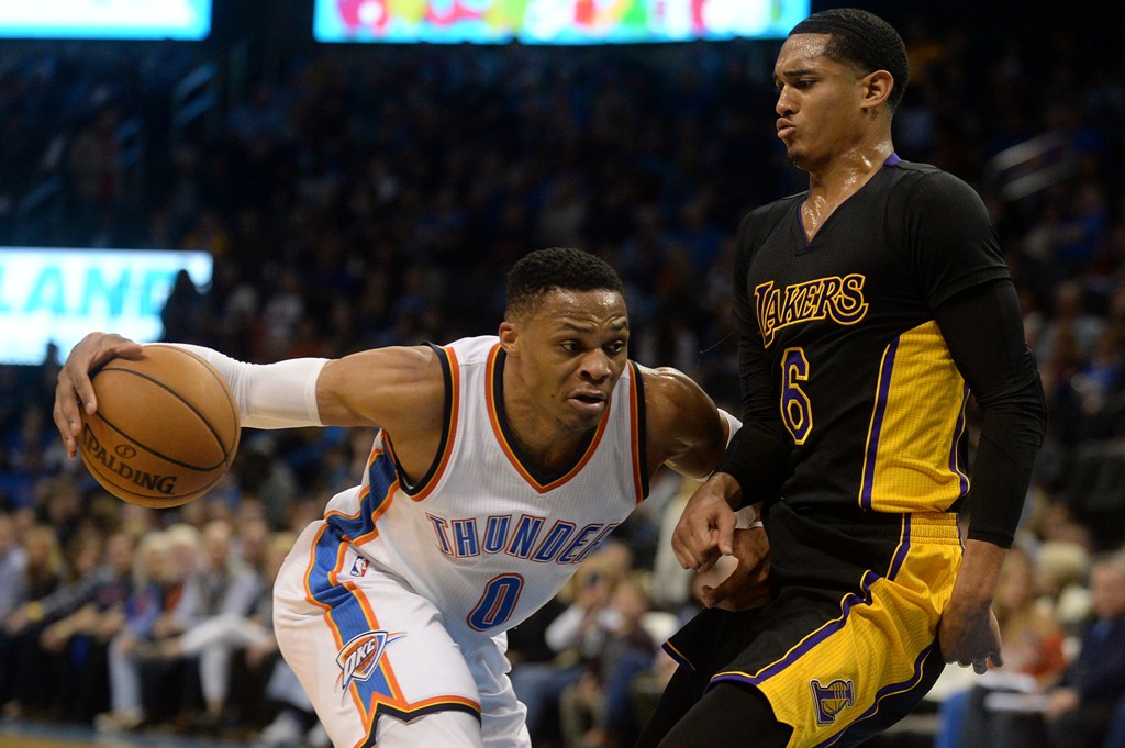 Oklahoma City Thunder guard Russell Westbrook (0) drives to the basket in front of Los Angeles Lakers guard Jordan Clarkson (6) during the fourth quarter at Chesapeake Energy Arena. Mandatory Credit: Mark D. Smith-USA TODAY Sports
