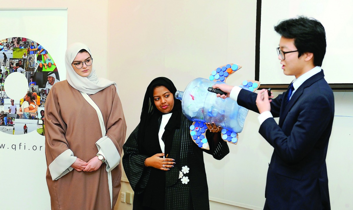 Students of a winning project ‘Plastic Turtles’ showcasing their work. Pic: Salim Matramkot / The Peninsula