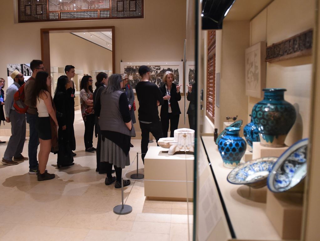 People listen to curators at the Metropolitan Museum of Art February 24, 2017 as ten-minute gallery talks are given in the permanent collection created in the lands that are now Iraq, Syria, Iran and Yemen. AFP / TIMOTHY A. CLARY 