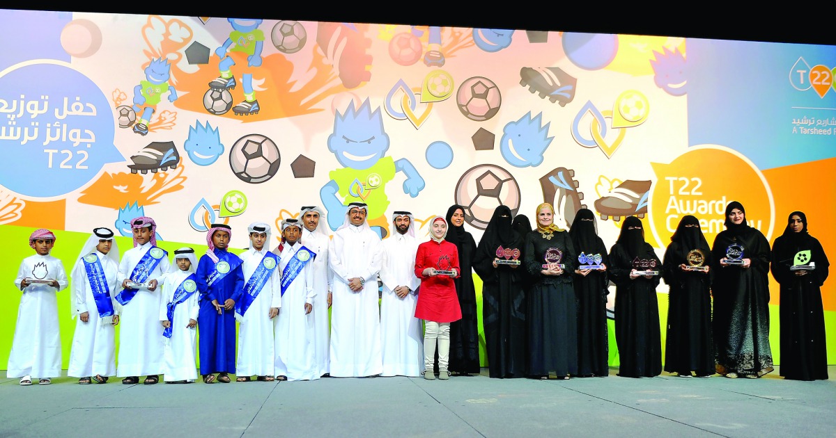 H E Dr Mohammed bin Saleh Al Sada, Minister of Energy & Industry, Hassan Al Thawadi, Secretary-General of the Supreme Committee for Delivery & Legacy (SC) and Eng Essa bin Hilal Al Kuwari, Kahramaa President, with the T22 Award winners at QNCC yesterday. 