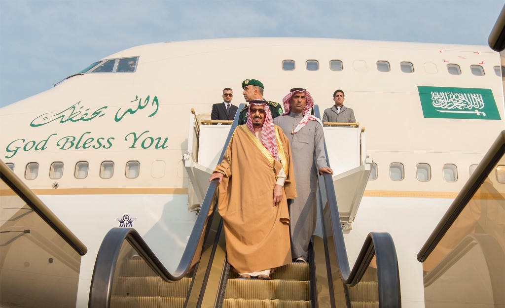 The Custodian of the Two Holy Mosques King Salman bin Abdulaziz Al Saud (L) is being welcomed by Yang Jiechi (not seen), State Councilor of the People's Republic of China (not seen) with an official welcoming ceremony at the airport in Beijing, China on M