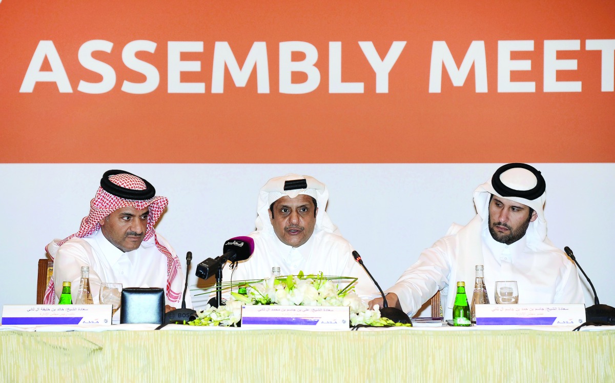 The Chairman of Milaha, Sheikh Ali bin Jassim bin Mohammad Al Thani (centre), addressing  the General Assembly Meeting of the company at the Four Seasons Hotel in Doha yesterday. Deputy Chairman, Sheikh Khalid bin Khalifa Al Thani (left), and Board Member