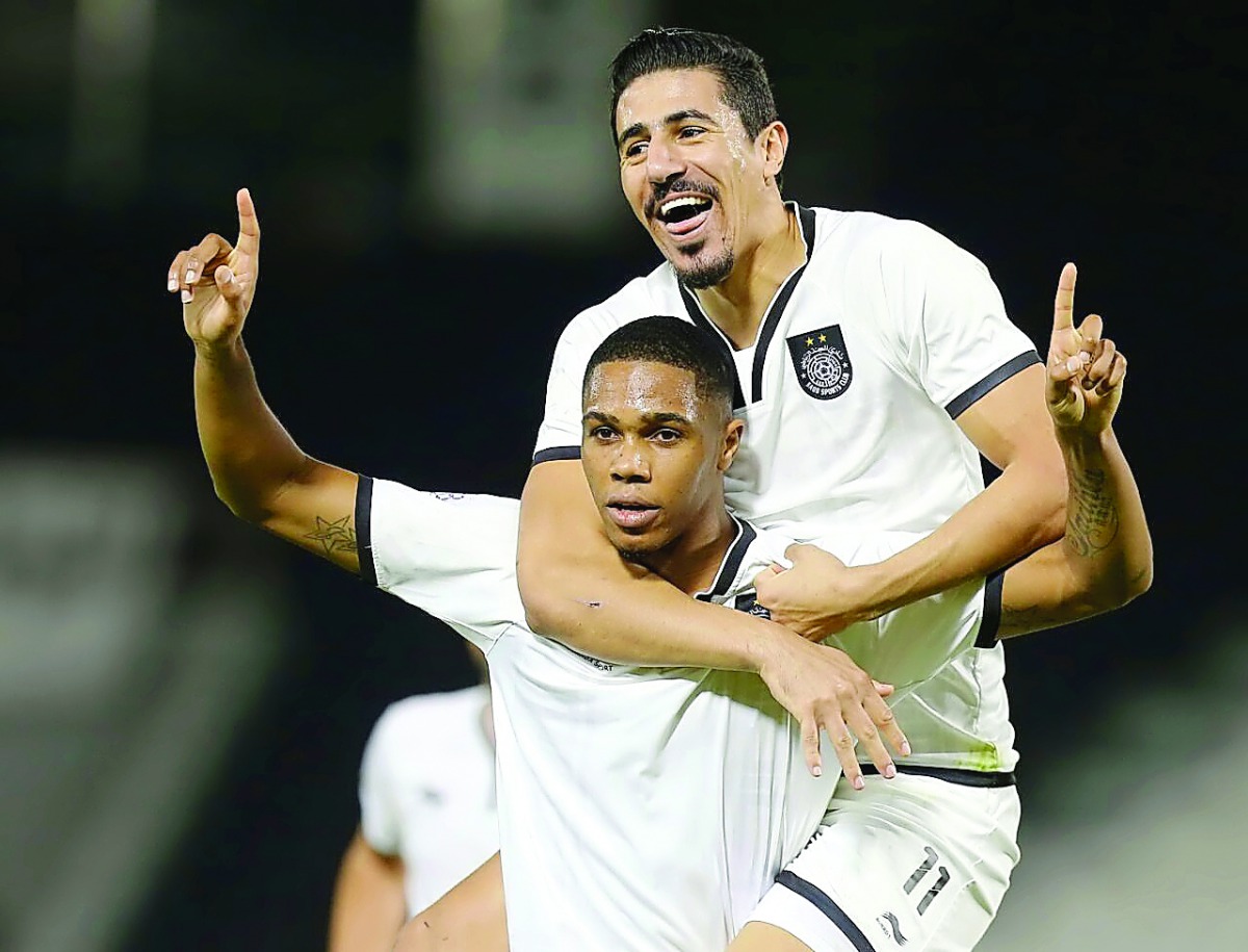 Al Sadd players celebrate after scoring a goal against Umm Salal in their Qatar Stars League Round 11 match in this file photo.