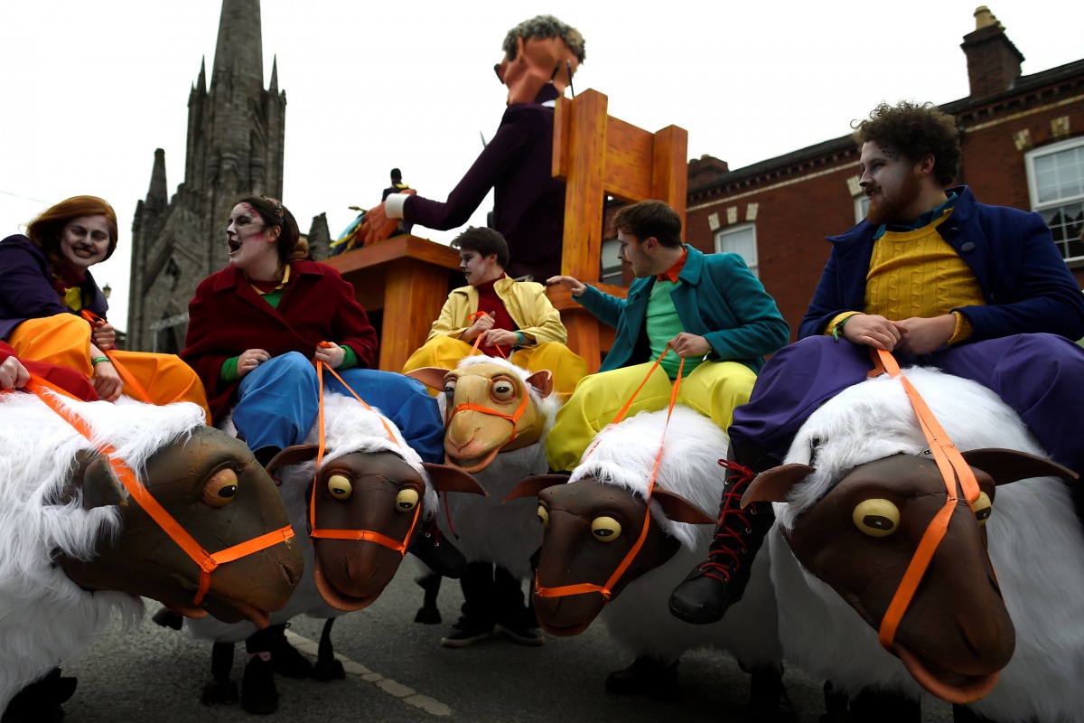 Participants on sheeps are seen during the St. Patrick's day parade in Dublin, Ireland March 17, 2017. REUTERS/Clodagh Kilcoyne