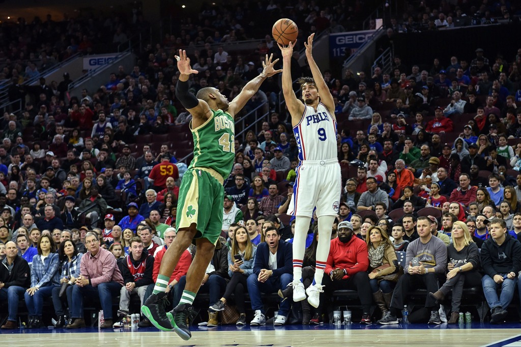 Philadelphia 76ers forward Dario Saric (9) shoots the ball as Boston Celtics center Al Horford (42) defends during the fourth quarter of the game at the Wells Fargo Center. The 76ers won 105-99.Credit: John Geliebter
