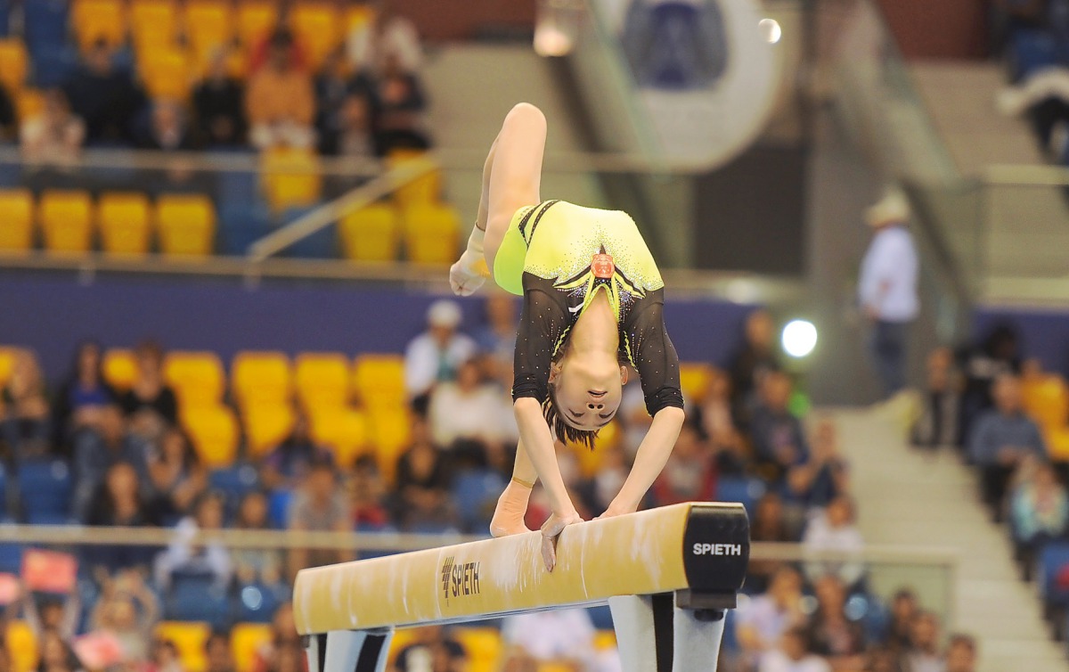 China's golden girl Liu Tingting in action during the final day of the 10th FIG Artistic World Cup, which concluded at Aspire Dome yesterday. Picture: Abdul Basit / The Peninsula