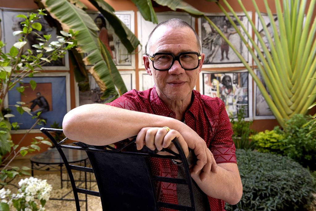 French photographer Youri Lenquette poses on March 4, 2017 at his home in the Senegalese capital Dakar. AFP / SEYLLOU