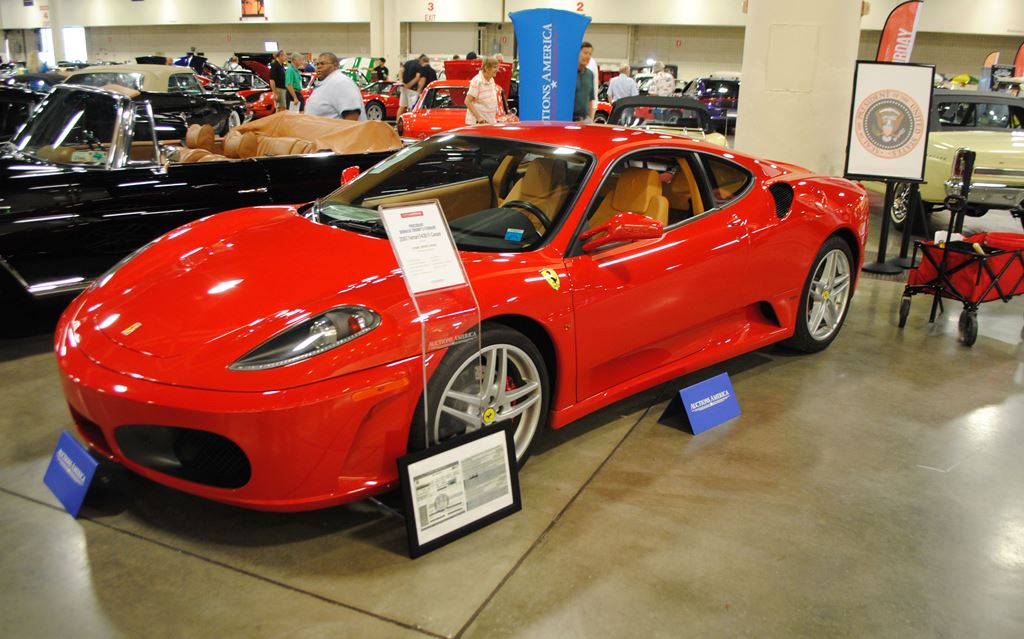 A Ferrari F430 owned by US president Donald J. Trump in 2007 is exhibited by Autcions America in Fort Lauderdale, Florida on March 31, 2017. AFP / Leila Macor 