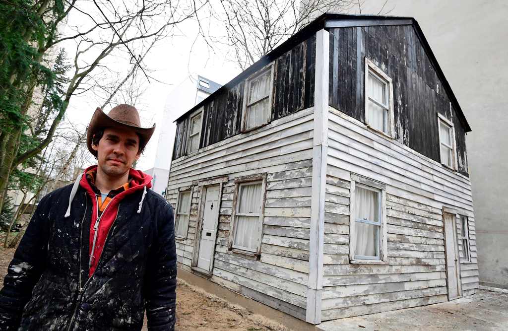 This file photo taken on March 29, 2017 shows artist Ryan Mendoza as he poses in front of Rosa Parks' house during an AFP interview in Berlin. AFP / Tobias Schwarz