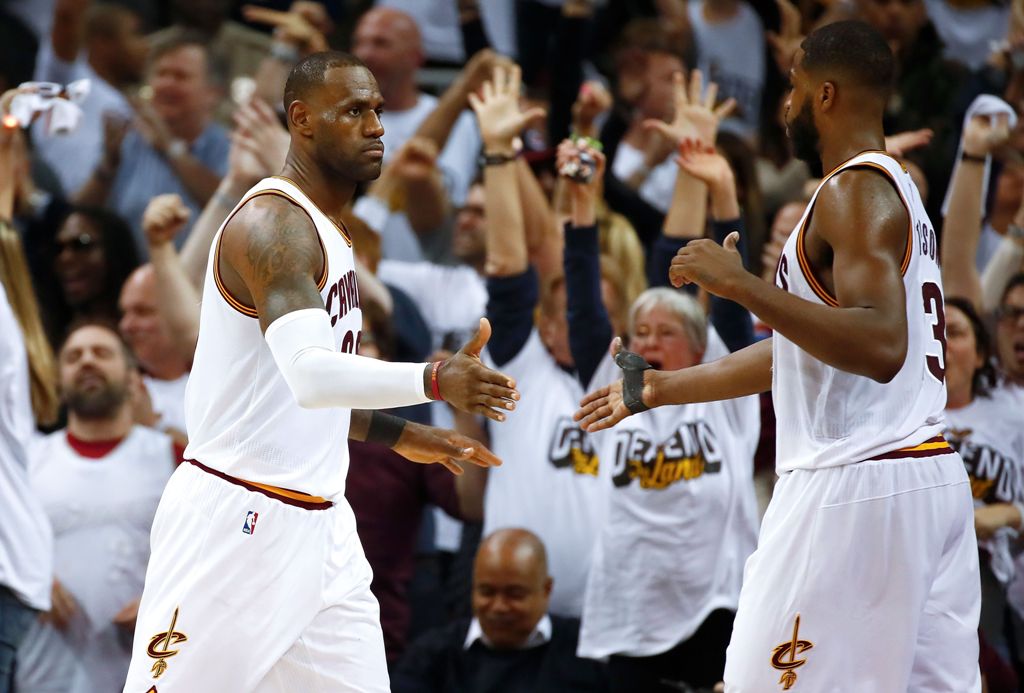 LeBron James #23 of the Cleveland Cavaliers reacts to a 109-108 win over the Indiana Pacers with Tristan Thompson #13 in Game One of the Eastern Conference Quarterfinals during the 2017 NBA Playoffs at Quicken Loans Arena on April 15, 2017 in Cleveland, O