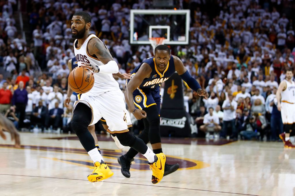 Kyrie Irving #2 of the Cleveland Cavaliers drives past CJ Miles #0 of the Indiana Pacers during the second half in Game Two of the Eastern Conference Quarterfinals during the 2017 NBA Playoffs at Quicken Loans Arena on April 17, 2017 in Cleveland, Ohio. G