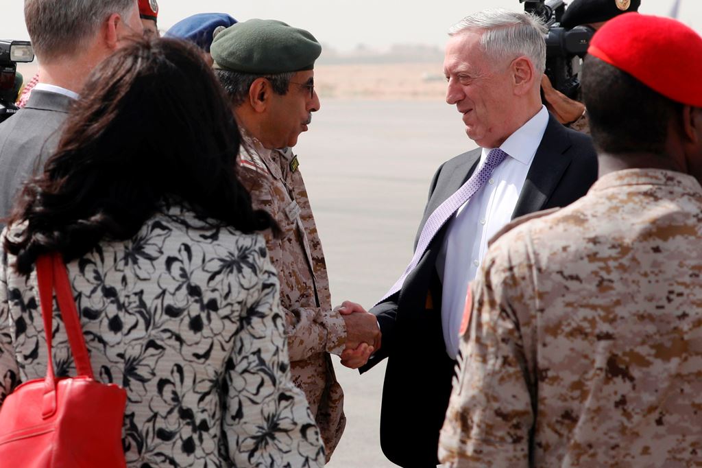 U.S. Defense Secretary James Mattis (C-R) is greeted by Saudi Armed Forces Chief of Joint Staff General Abdul Rahman Al Banyan (C-L) upon his arrival at the Riyadh Air Base on April 18, 2017 at the start of a Middle East tour. / AFP / POOL / JONATHAN ERNS