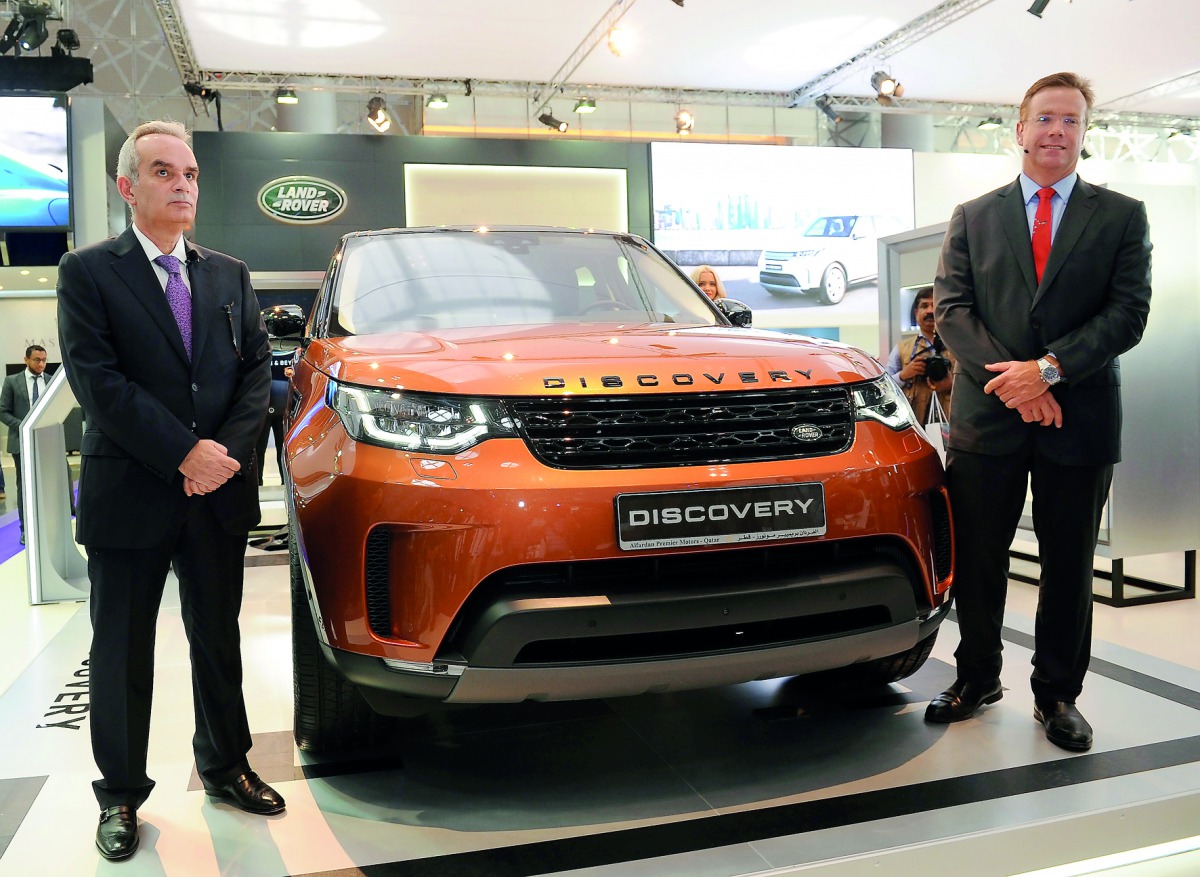 Officials with the All-New Land Rover Discovery SUV at the Qatar Motor Show. Pic: Salim Matramkot / The Peninsula