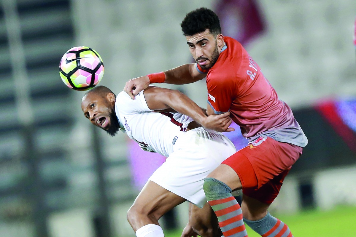 El Jaish's mid-fielder Seydou Keita (left) heads the ball as a Lekhwiya player looks on during the Qatar Cup semi-final played at Al Sadd Stadium yesterday. The defending champions El Jaish reached the final of the tournament by defeating the reigning Qat