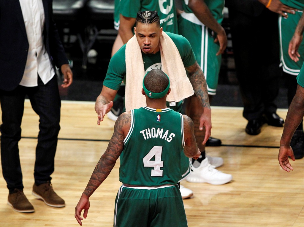 Boston Celtics forward Gerald Green (30) and guard Isaiah Thomas (4) celebrate during the second half in game three of the first round of the 2017 NBA Playoffs against the Chicago Bulls at United Center. Credit: Caylor Arnold
