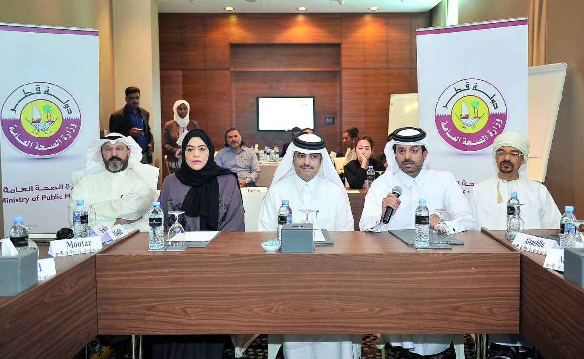 Dr Mohammed Al Thani (centre), Director of Public Health; with Dr Hamad Eid Al Rumaihi, Director of the Health Protection and Communicable Disease Control Department, and Dr Soha Al Bayat, Head of Vaccination Unit at the Ministry of Public Health, with ot