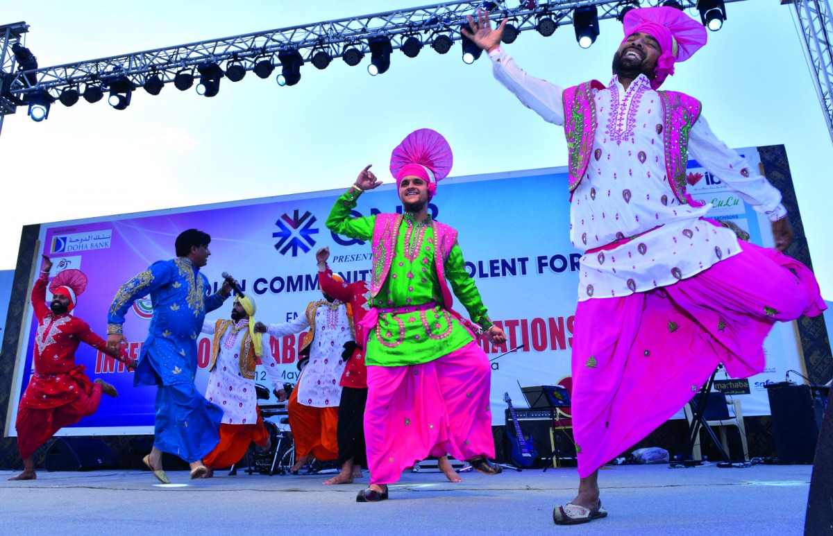 Artistes perform during the International Labour Day celebrations hosted by ICBF at the Asian Town, yesterday. Pic: Baher Amin / The Peninsula