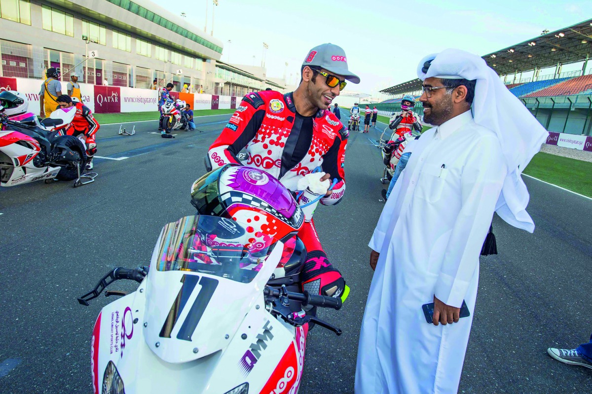 QMMF President Abdulrahman Al Manna and Qatari rider Saeed Al Sulaiti sharing light moment in this file photo.