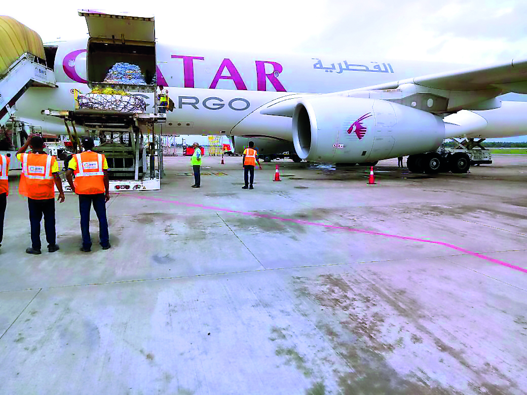 The new stocks of vegetables being unloaded from Qatar Cargo.